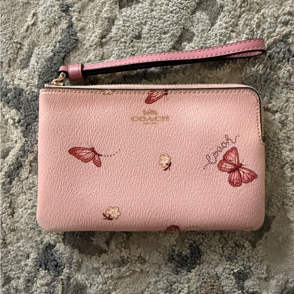 COACH pink butterfly wristlet